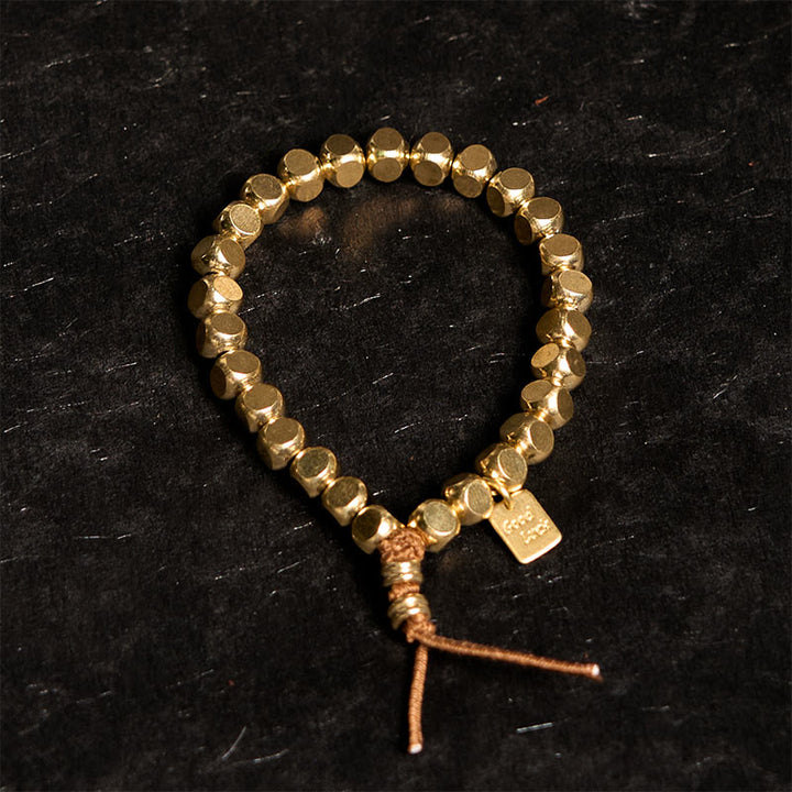 Buddha Stonesと真鍮・銅糸を使った幸運とセルフケアのためのブレスレット - image 1