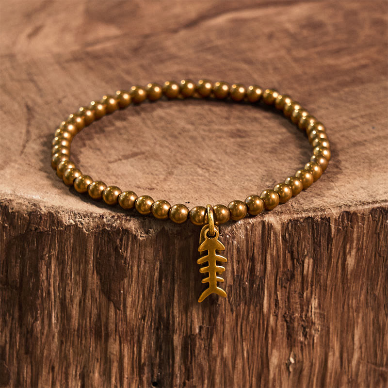 Buddha Stones、真鍮、銅、魚の骨を使ったヒーリングブレスレット - image 9