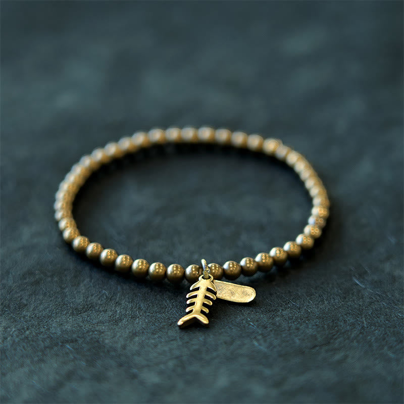 Buddha Stones、真鍮、銅、魚の骨を使ったヒーリングブレスレット - image 8