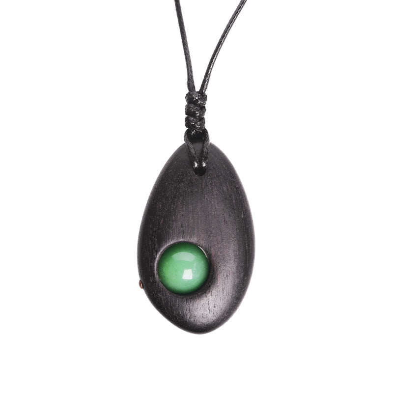 Buddha Stones、黒檀、グリーンアベンチュリン、平和の穏やかなネックレスペンダント