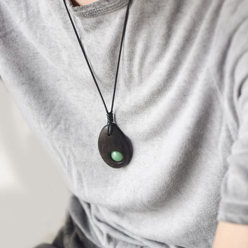 Buddha Stones、黒檀、グリーンアベンチュリン、平和の穏やかなネックレスペンダント