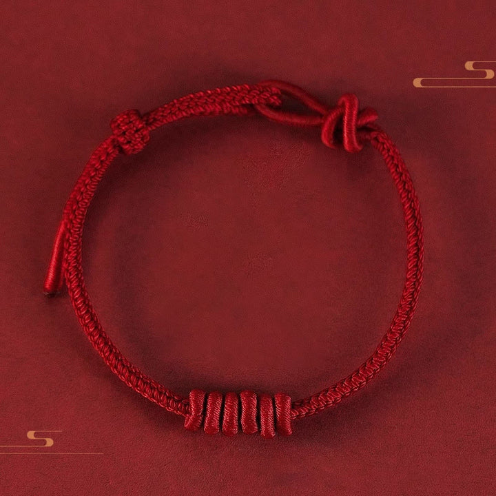 Buddha Stonesの赤い糸の8本撚りロープの強さのブレスレット