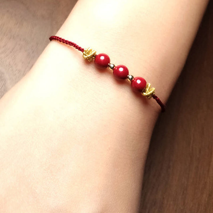 Buddha Stonesのカラフルな紐、辰砂の落ち着いたブレスレット