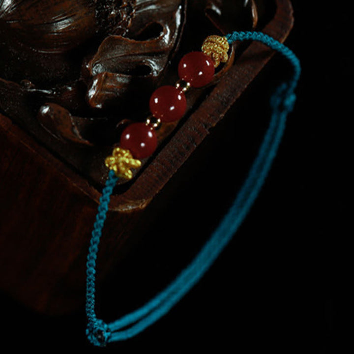 Buddha Stonesのカラフルな紐、辰砂の落ち着いたブレスレット