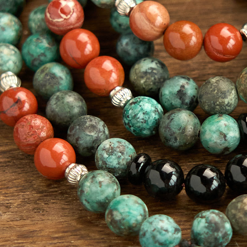 Buddha Stones 108Mala天然ブラックオニキス レッドジャスパー ターコイズビーズ 仏陀の頭 タッセル 保護ブレスレット