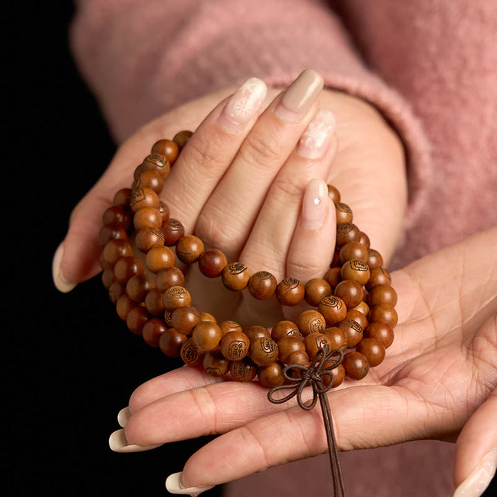 Buddha Stones108 個のMala雷に打たれたナツメの木 黄金の光のマントラの保護ブレスレット