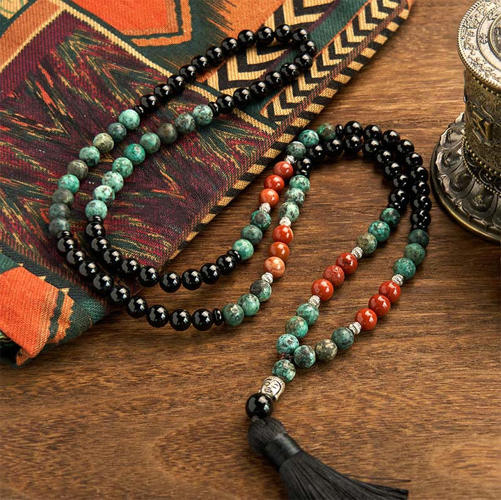 Buddha Stones 108Mala天然ブラックオニキス レッドジャスパー ターコイズビーズ 仏陀の頭 タッセル 保護ブレスレット