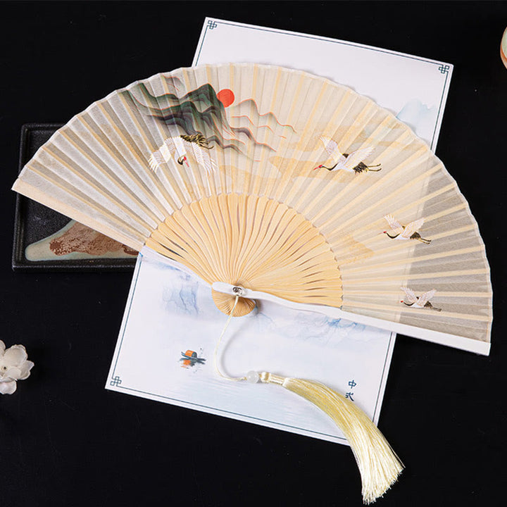 Buddha Stones、鶴、吉祥雲、単色グラデーションの手持ち竹製折りたたみ扇子 - サンセットクレーン イエロー 21cm - image 3