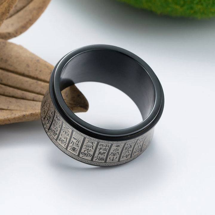 Buddha Stones チベット印章モチーフ 黄金の光マントラ入り チタン鋼製スピナーバランスリング