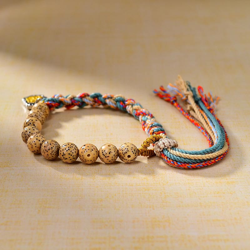 Buddha Stonesチベット色ロープ菩提樹 ザキラム 富の女神 調節可能な保護ブレスレット