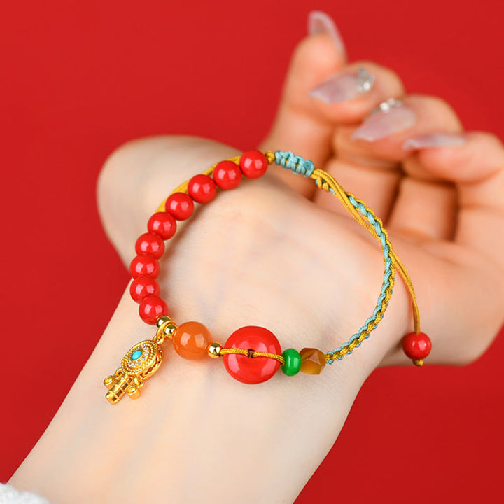 Buddha Stones辰砂 紐 平和バックル 祝福ブレスレット