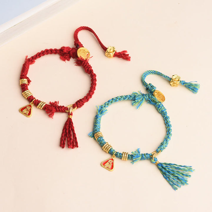 Buddha Stonesチベット紐ザキラム富の女神花タッセル保護ブレスレット