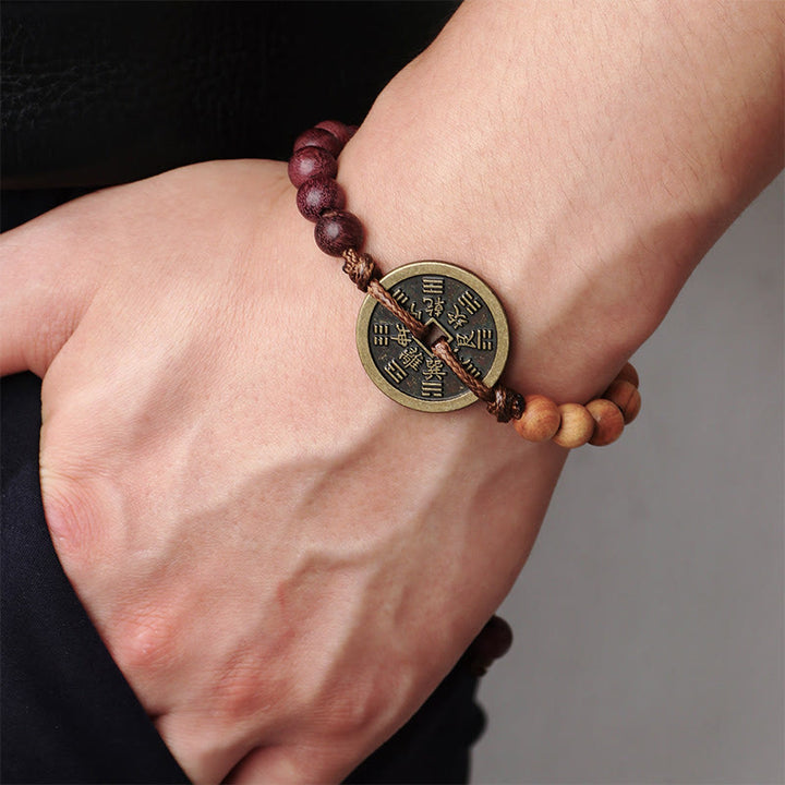 Buddha Stones、黒檀、ウェンジ材、山の幽霊、お金を使う八卦銅貨、平和のブレスレット