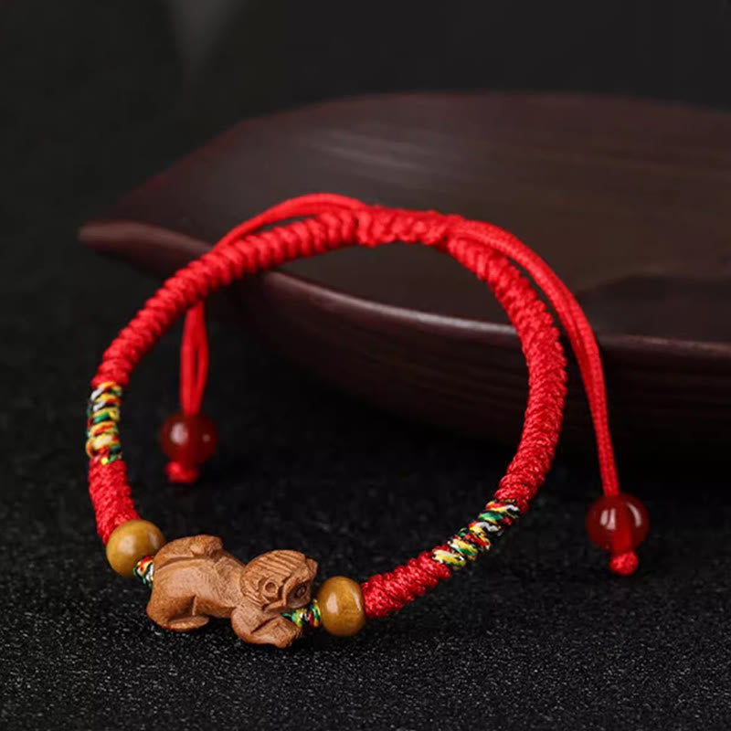 Buddha Stones手作りの中国の十二支の赤紐の桃の木の幸運ブレスレット