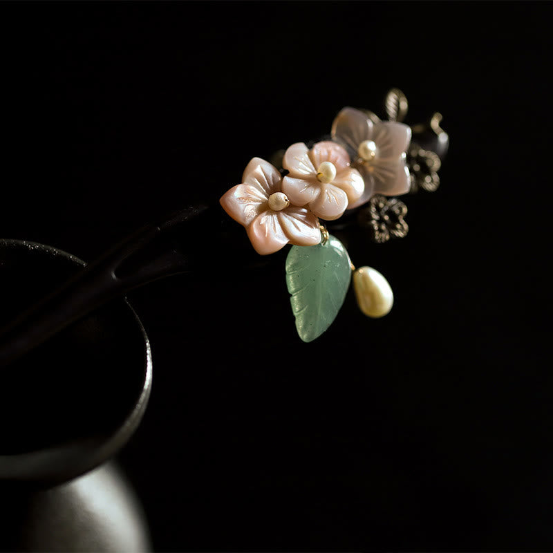 Buddha Stones、黒檀貝、花葉、祝福の簪