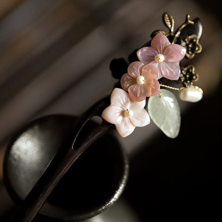 Buddha Stones、黒檀貝、花葉、祝福の簪