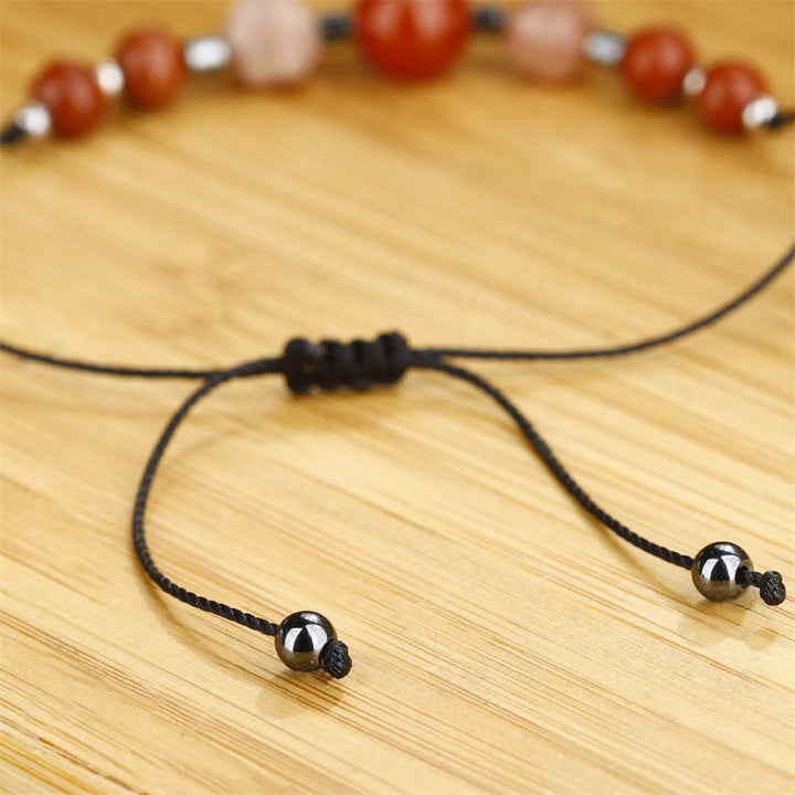 Buddha Stonesは、あなたができると信じています。カーネリアン、レッドジャスパー、ヘマタイト、サンストーンのポジティブなブレスレット