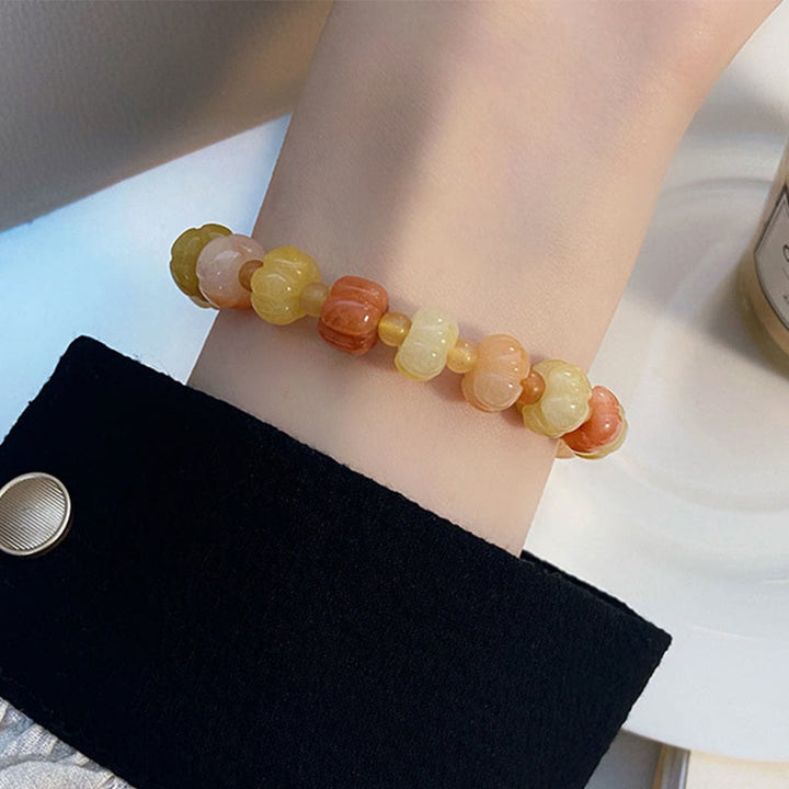 Buddha Stonesゴールデンシルク 翡翠 かぼちゃビーズ 富と幸運のブレスレット