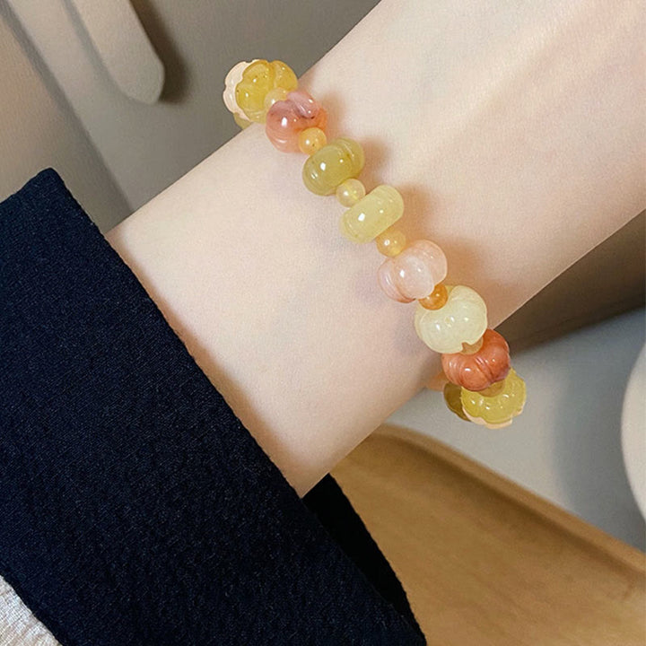 Buddha Stonesゴールデンシルク 翡翠 かぼちゃビーズ 富と幸運のブレスレット