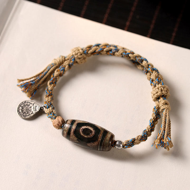 Buddha StonesチベットのDziビーズ富の守護編みブレスレット