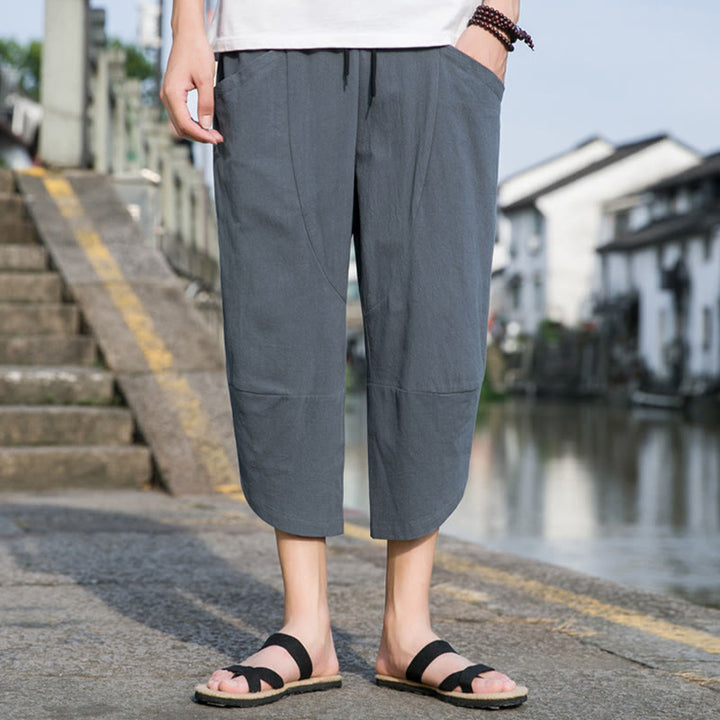 Buddha Stones夏 カジュアル シンプル 無地 テーパードデザイン ドローストリング メンズ 7-8丈 コットンリネンパンツ ポケット付き - image 1