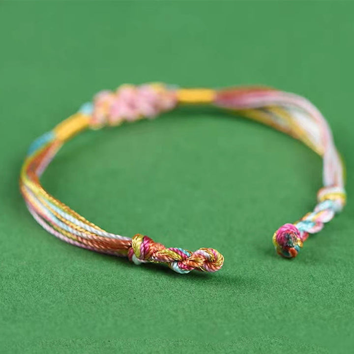 Buddha Stonesのカラフルなロープの桃の花の結び目粽編みブレスレット