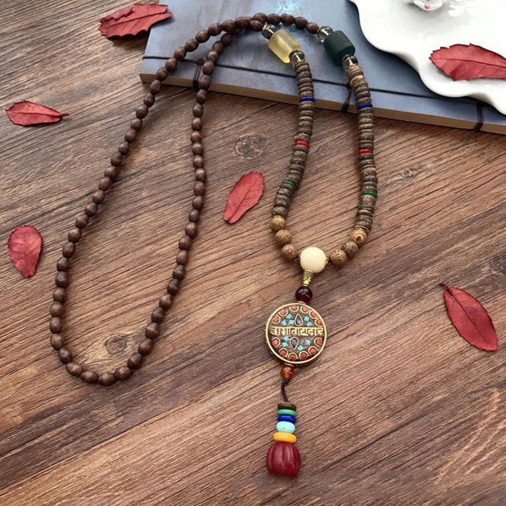 Buddha Stonesチベット 手作り ココナッツシェル シマウッド グレートブライトマントラ 銅ビーズ バランスネックレス ペンダント