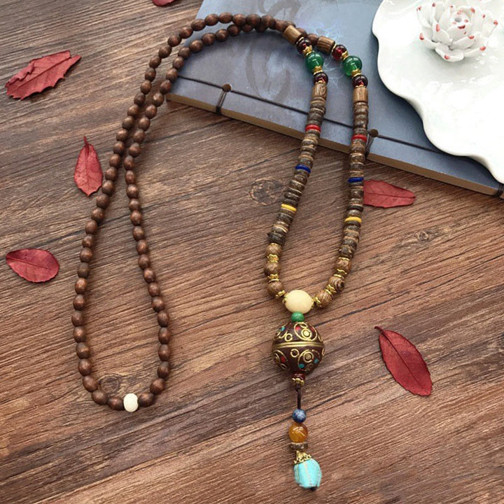 Buddha Stonesチベット 手作り ココナッツシェル シマウッド グレートブライトマントラ 銅ビーズ バランスネックレス ペンダント