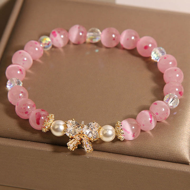 Buddha Stones桜 ピンク キャッツアイ パール 蝶結び ロゼット サポート ブレスレット