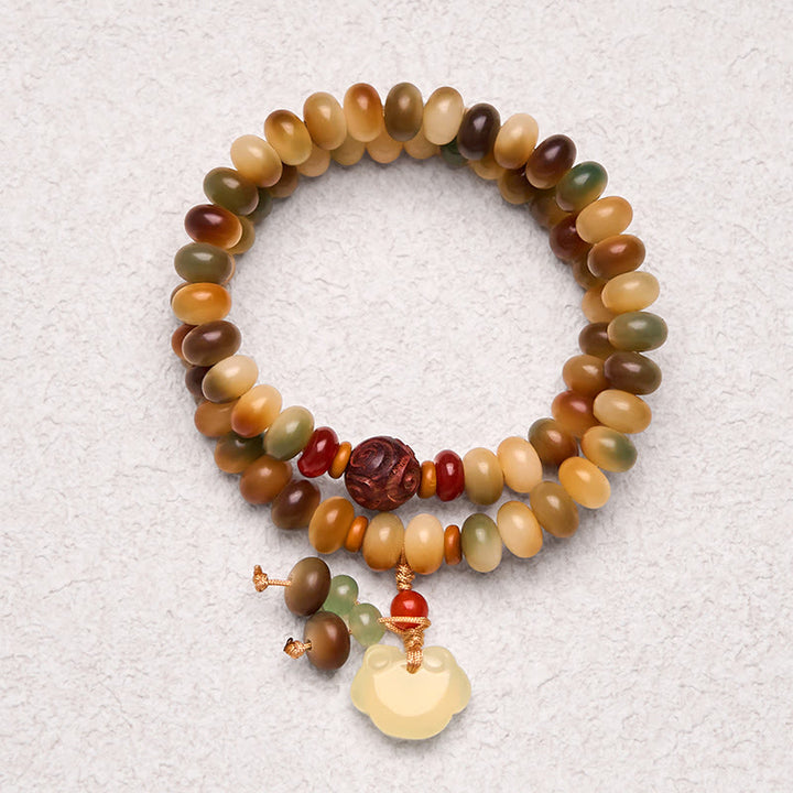 Buddha Stonesカラフルな菩提樹の種 平和の鍵チャーム 知恵のそろばんビーズ ダブルラップブレスレット
