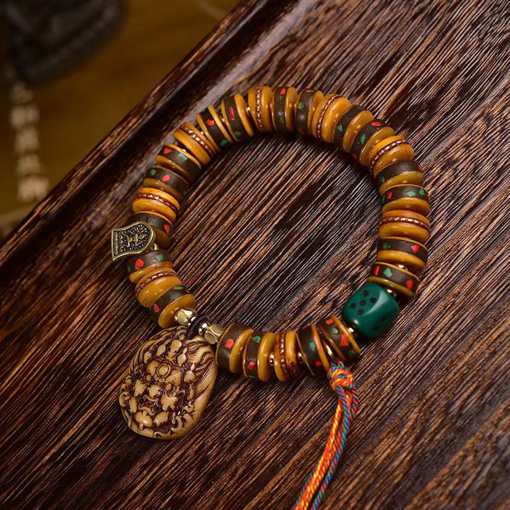 Buddha Stonesチベットラクダ骨サイコロタッセル保護ブレスレット