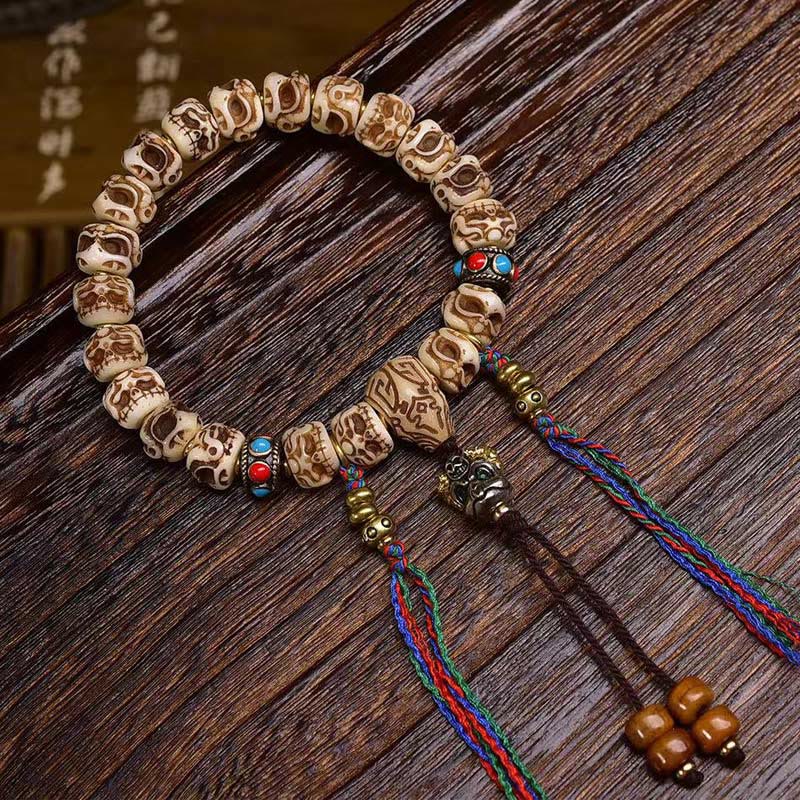Buddha Stonesチベットラクダ骨ガルーダ彫刻保護タッセルブレスレット