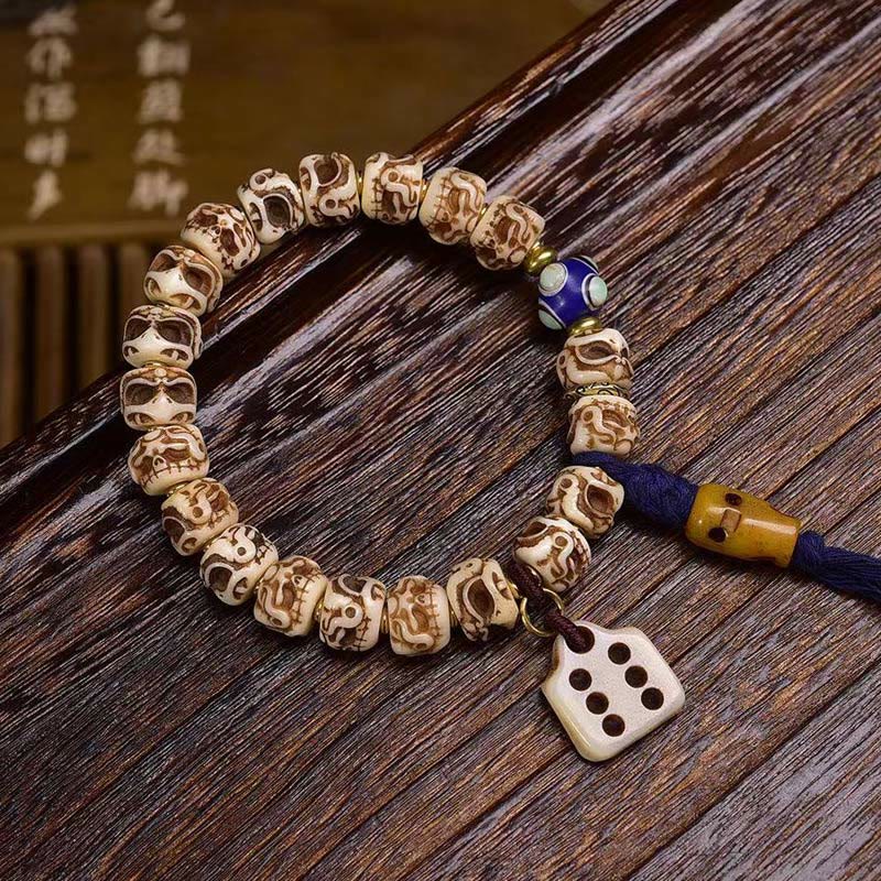 Buddha Stonesチベットラクダ骨ガルーダ彫刻保護タッセルブレスレット