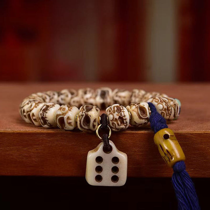 Buddha Stonesチベットラクダ骨ガルーダ彫刻保護タッセルブレスレット