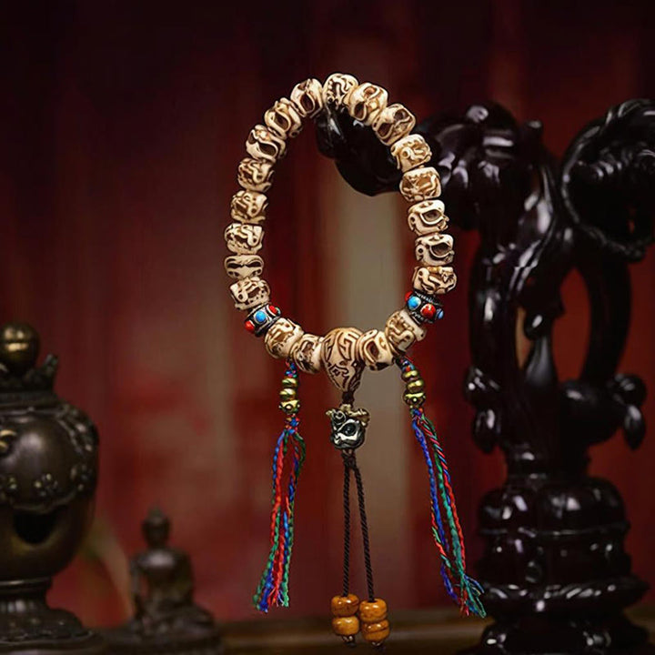 Buddha Stonesチベットラクダ骨ガルーダ彫刻保護タッセルブレスレット
