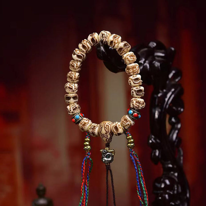 Buddha Stonesチベットラクダ骨ガルーダ彫刻保護タッセルブレスレット