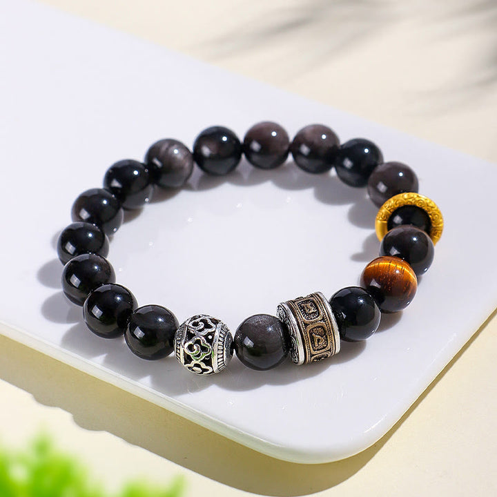 Buddha Stonesシルバーシーンオブシディアン タイガーオーム・マニ・パドメ・フム守護ブレスレット