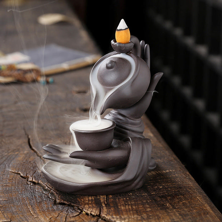 Buddha Stones仏陀の手を持つティーポットカップ セラミック逆流煙噴水 癒しの香炉装飾 - ブラウン ブラック 13.7*9*13.9cm - image 1