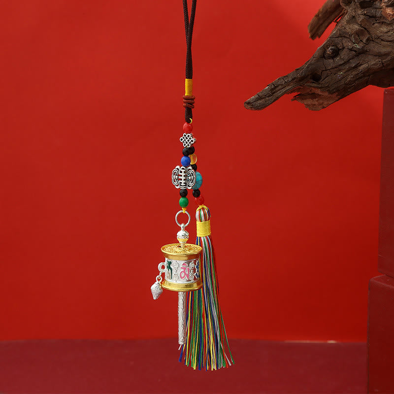 Buddha Stonesの祈祷ホイール、オーム・マニ・パドメ・フムのカラフルなタッセル、清浄のキーチェーン - ミディアムシルバー - image 5
