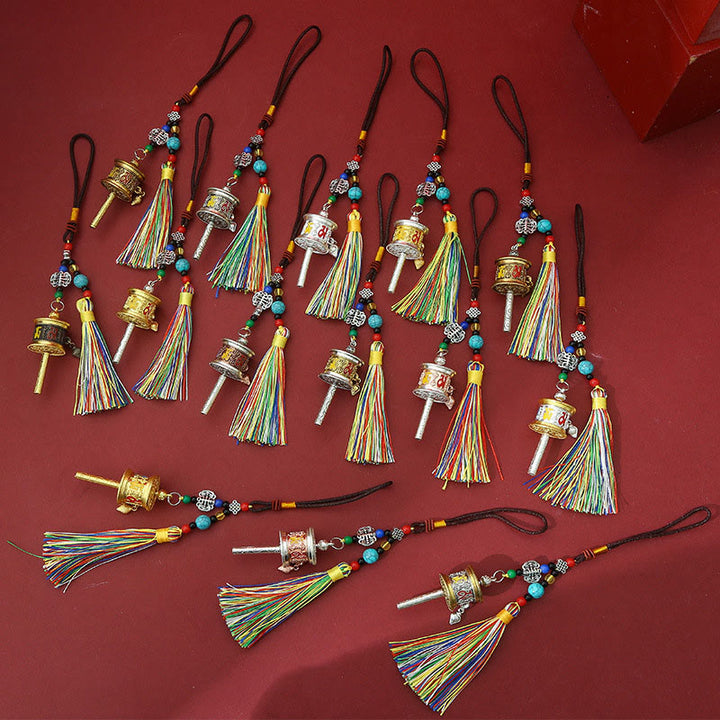 Buddha Stonesの祈祷ホイール、オーム・マニ・パドメ・フムのカラフルなタッセル、清浄のキーチェーン - image 15