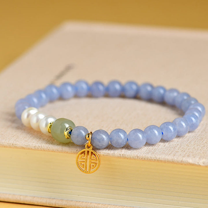 Buddha Stones ブルーカルセドニーパールビーズのエナジーブレスレット - image 1
