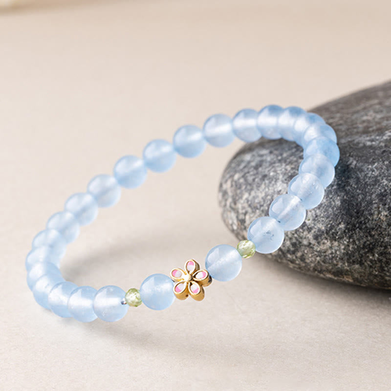 Buddha Stones 天然アクアマリンと金メッキ銅製フラワーヒーリングブレスレット - image 3