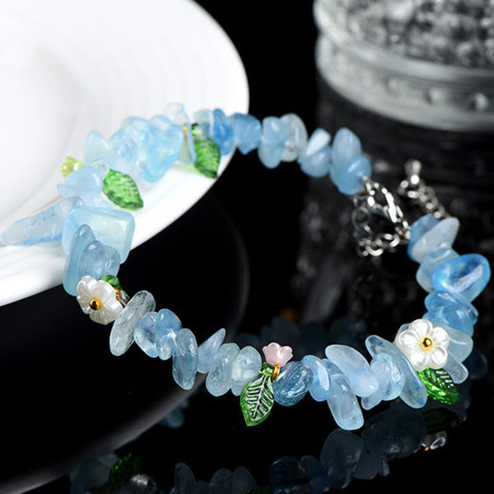 Buddha Stones 天然アクアマリン、ペリドット、ストロベリークォーツ、各種クリスタルを使用したセレニティブレスレット - image 3