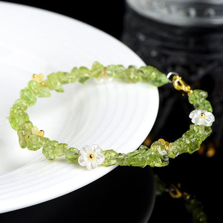 Buddha Stones 天然アクアマリン、ペリドット、ストロベリークォーツ、各種クリスタルを使用したセレニティブレスレット - image 15