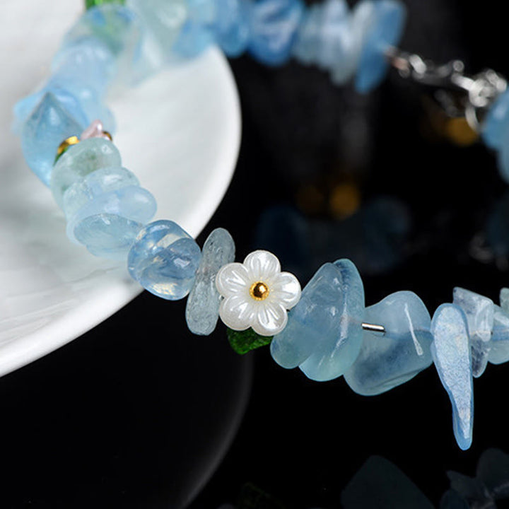 Buddha Stones 天然アクアマリン、ペリドット、ストロベリークォーツ、各種クリスタルを使用したセレニティブレスレット - image 11