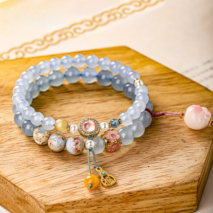 Buddha Stones ブルーカルセドニーの「福」の文字と猫の足跡をモチーフにしたヒーリングブレスレット - 猫の肉球（手首周り：14～15cm） - image 0