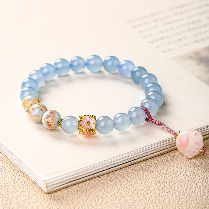 Buddha Stones ブルーカルセドニーの「福」の文字と猫の足跡をモチーフにしたヒーリングブレスレット - image 1