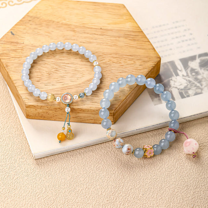 Buddha Stones ブルーカルセドニーの「福」の文字と猫の足跡をモチーフにしたヒーリングブレスレット - image 5