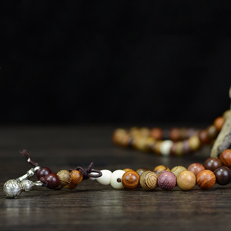 Buddha Stones 108個のビーズ、マルチトーンの天然木製、穏やかなエネルギーマーラー数珠 - image 6