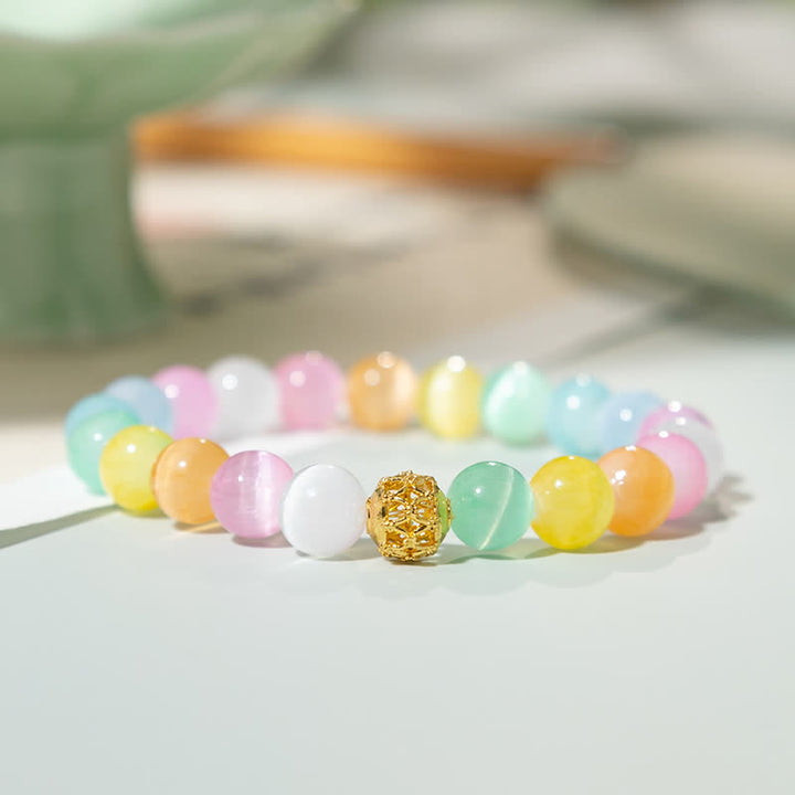 Buddha Stones 中空デザインのマルチカラーキャッツアイラウンドビーズ幸運を呼ぶブレスレット - カラフルなキャッツアイ（手首周り15～16cm） - image 0